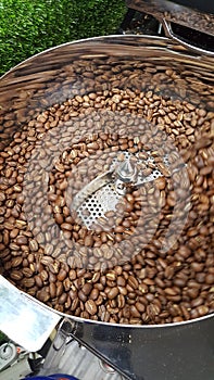 Coffee roasters cooling bean with roasted coffee photo