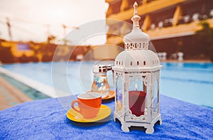 Coffee serve on hotel swimming pool relax table