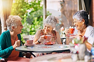 Coffee shop, funny and senior women talking, laughing and having friends reunion, retirement chat or social group