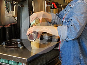 Coffee Shop Worker Mixing Coffee