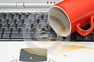 Coffee spill on a laptop computer keyboard