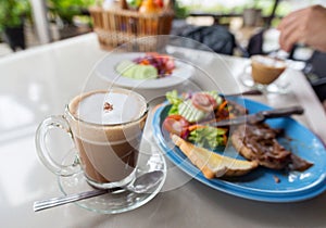 Coffee and steaks on the table.