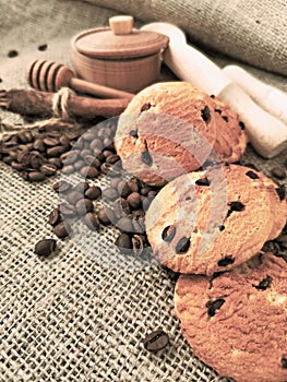 Coffee still life. Cookies for coffee. Coffee beans and fragrant cinnamon