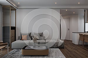 Coffee table on the Gray Mat, Gray Modular Sofa Frontward white Wall in living area