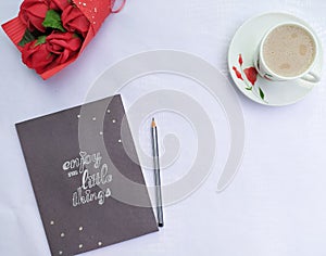 Coffee tea book whute background table study roses bouquet