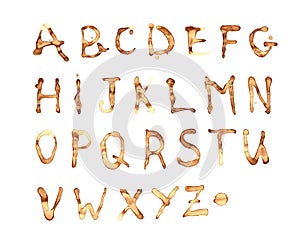 Coffee or tea broun spots. Coffee alphabet stamps photo