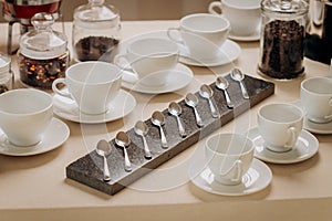 Coffee or tea cups on catering table at conference or wedding banquet table