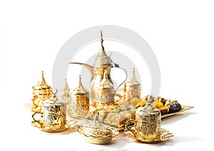 Coffee tea cups golden decoration Oriental hospitality photo