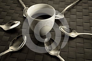 Coffee and teaspoons still life