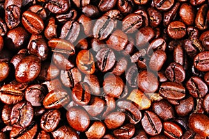 Coffee texture. Roasted coffee beans as background wallpaper. Beautiful arabica real cofee bean illustration for any