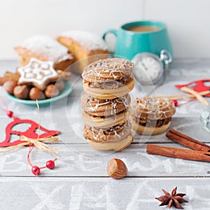 Coffee time with cookies, xmas decor. Cinnamon and nuts, Christmas bacground