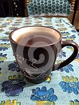 Coffee time full of coffee in coffee cup on the table