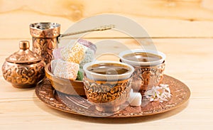 Coffee and Turkish delight in a copper cups