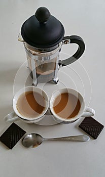 Coffee in small cups and cafetiere photo