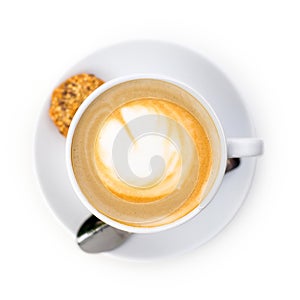Coffee on a White Background. Coffee in a white cup with latte art. Flat lay, copy space
