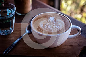 Coffee white cup classic on wood table in the moring time