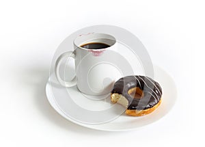 Coffee in White mug and chocolate donuts on a white plate on the white, Cup of coffee with lipstick mark