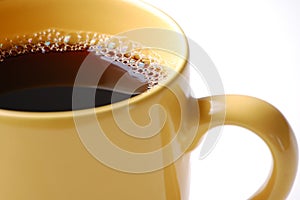 Coffee in yellow mug