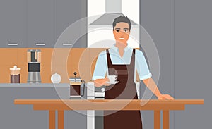 Coffeehouse kitchen interior with smiling young barista in apron holding cup of coffee