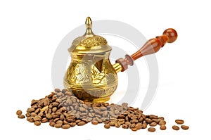 Coffeepot and coffee beans on white background