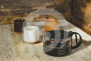 Coffepot and three cups