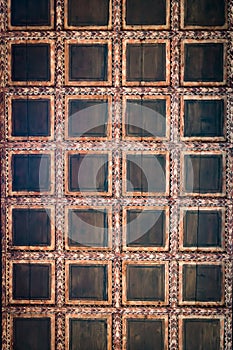 Coffered wooden ceiling detail.