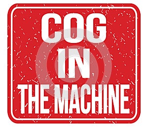 COG IN THE MACHINE, words on red stamp sign