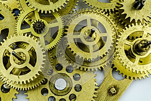 Cog-wheels from the bronze of old machine as a background