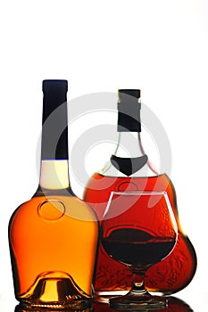 Cognac bottles and glass