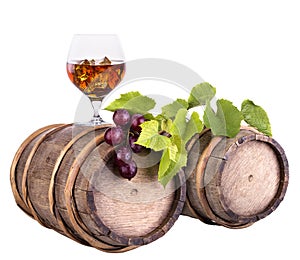 Cognac or brandy on a wooden barrel