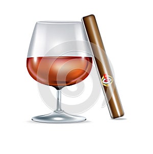 Cognac glass and cigar isolated