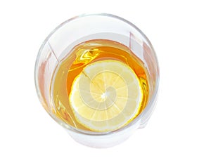 Cognac in a glass, with lemon