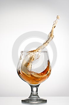 Cognac glass with splash