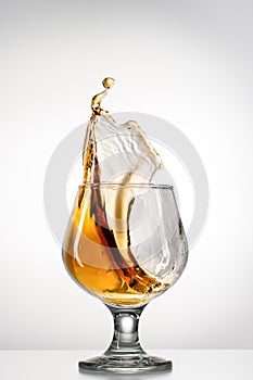 Cognac glass with splash