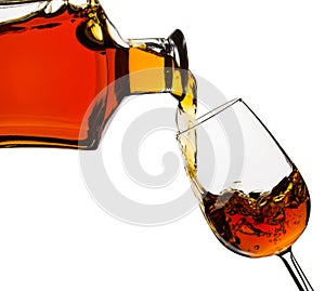 Cognac pouring into the glass