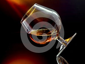 Cognac in tilted wineglass