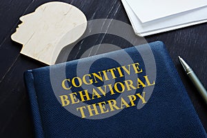 Cognitive behavioral therapy CBT book and head shape