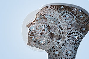 Cogs and gears inside human`s head. Intelligence and psychology concept. 3D rendered illustration.