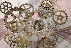 Cogs and gears with a map in the background. Steampunk concept.