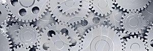 Cogwheel. Gear mechanism. Business cooperation concept. Multiple objects. Metaphor. Industrial engineering.