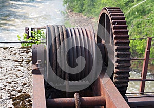 Cogwheel of old dam closing mechanism, close-up