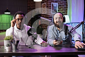 Cohosts presenting entertaining show