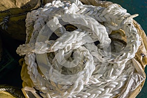 Coil of a hawser rope on board a construction work barge