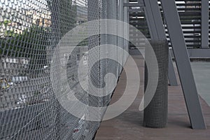Coil of steel wire. Rabitz mesh netting roll as background. Construction iron wire or mesh in a roll. Mesh wire rolls of iron