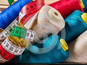 Coil threads for overlock and measuring tape in sewing supplies
