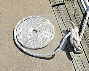 Coiled boat mooring rope photo