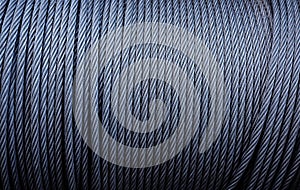 Coiled industrial cabling.Background of galvanized metal cable on the winch