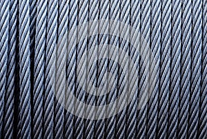 Coiled industrial cabling.Background of galvanized metal cable on the winch