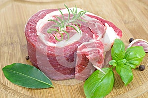 Coiled raw beef with basil