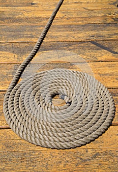Coiled rope on a pier background